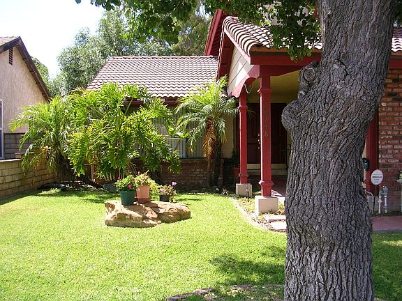 Front door entry & Landscape; Landscape may undergo minor changes