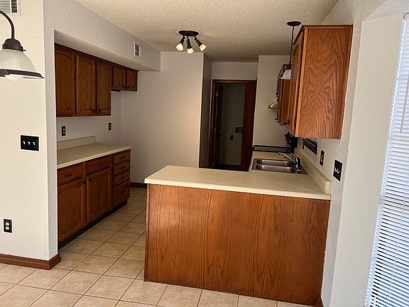 Kitchen, area with laundry room off Kitchen
