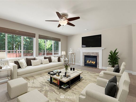 Large open concept living with views of kitchen, dining, eat-in kitchen, deck and beautiful backyard with expansive greenbelt. Virtually Staged 