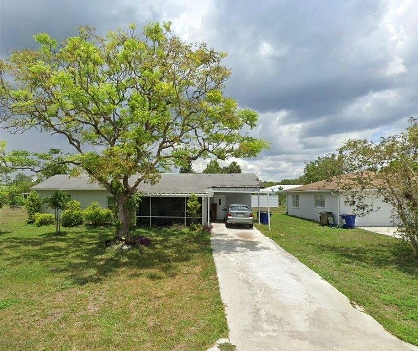 1st image of 121 E 3rd St