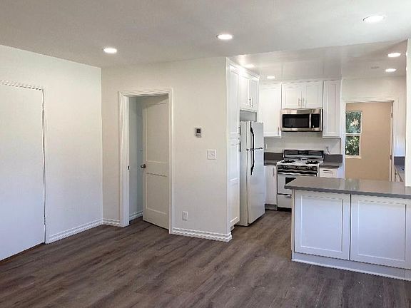 large kitchen that opens to the living room