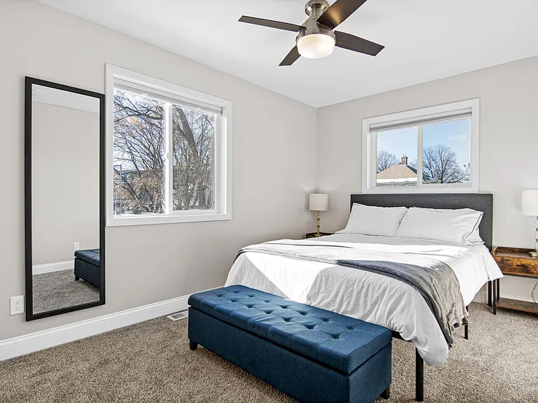 Second bedroom upstairs. View of the city from the south facing window!