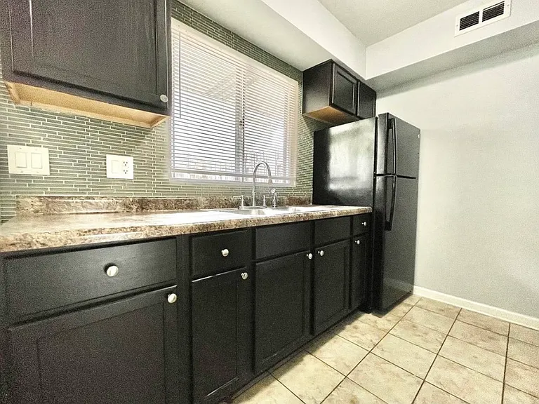 6055 Kit Carson Dr — Photo 10