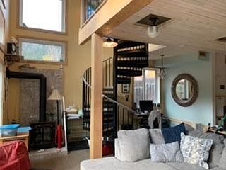 Spiral staircase up to loft bedroom