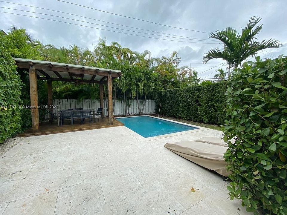 Modern and elegant swimming pool with gazebo on the side