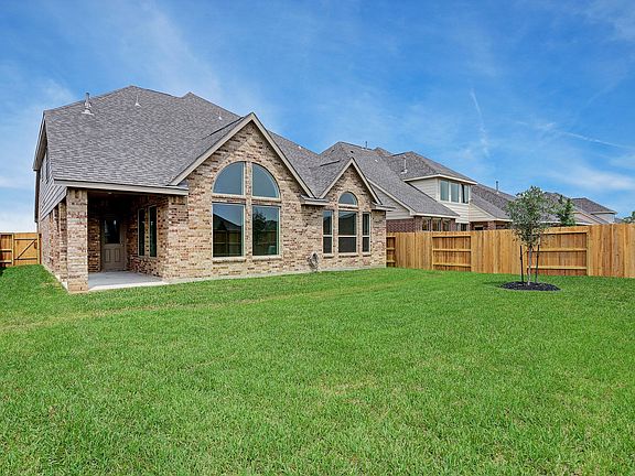 Large backyard with covered patio