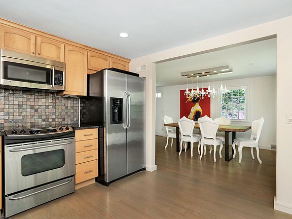 Kitchen has perfect flow to dining room