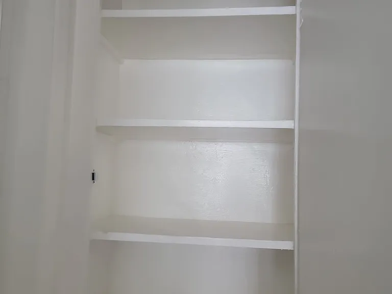 Storage by bedroom door