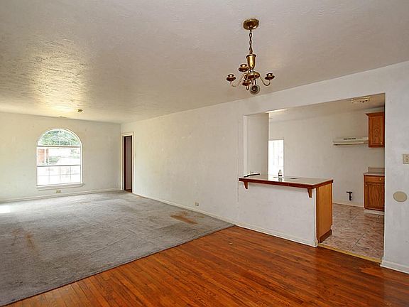 Formal dining room connects to the light and bright living room!