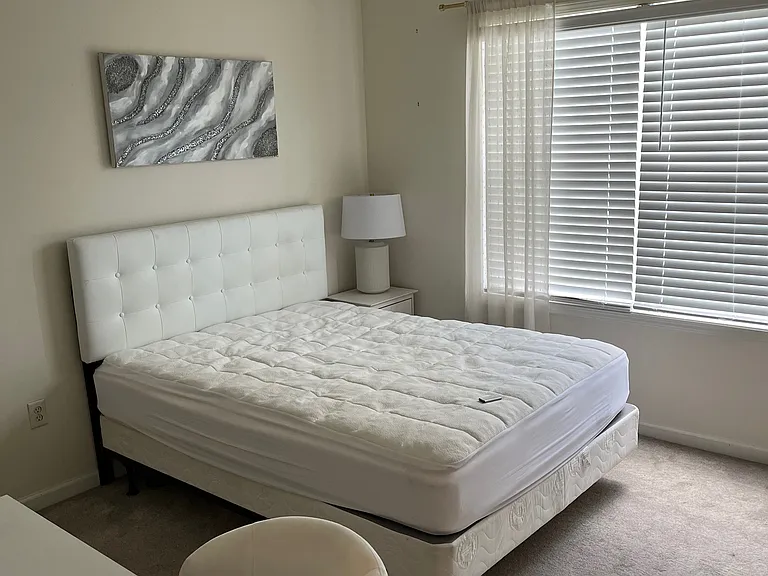 One of 3 bedrooms upstairs. Blinds remain, furniture does not. Newer carpet and good sized closet in each bedroom.