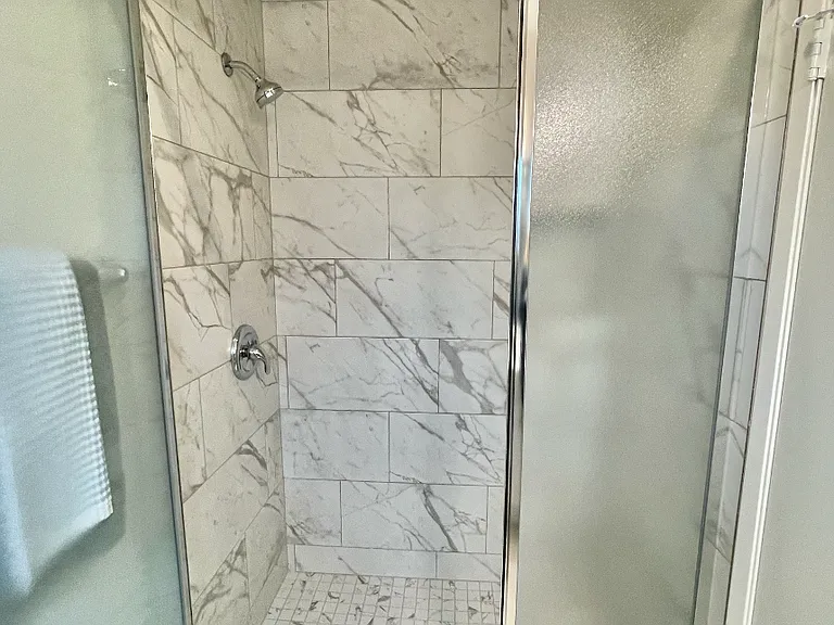 Primary En suite bathroom with remodeled shower