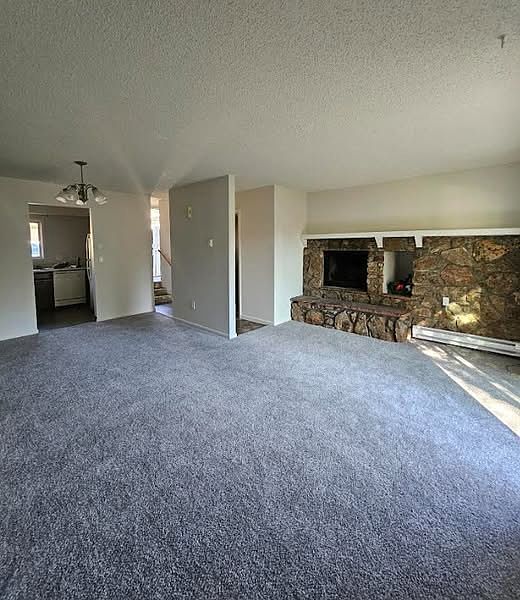 New carpet and baseboard heaters for maxiumum efficiency.