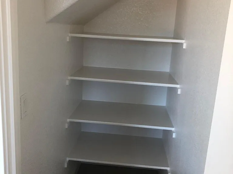 Pantry view under stairs