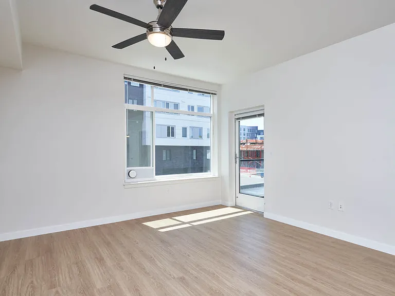 Living Room with Balcony and Hard Surface Flooring