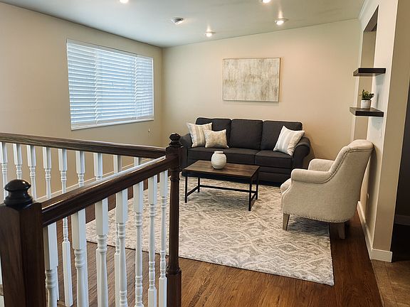 Large front room with original hardwood floors