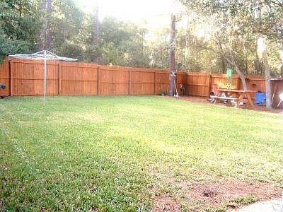 Exterior backyard fenced in