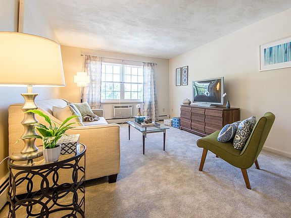 Wall-to-wall carpeting in neutral tones