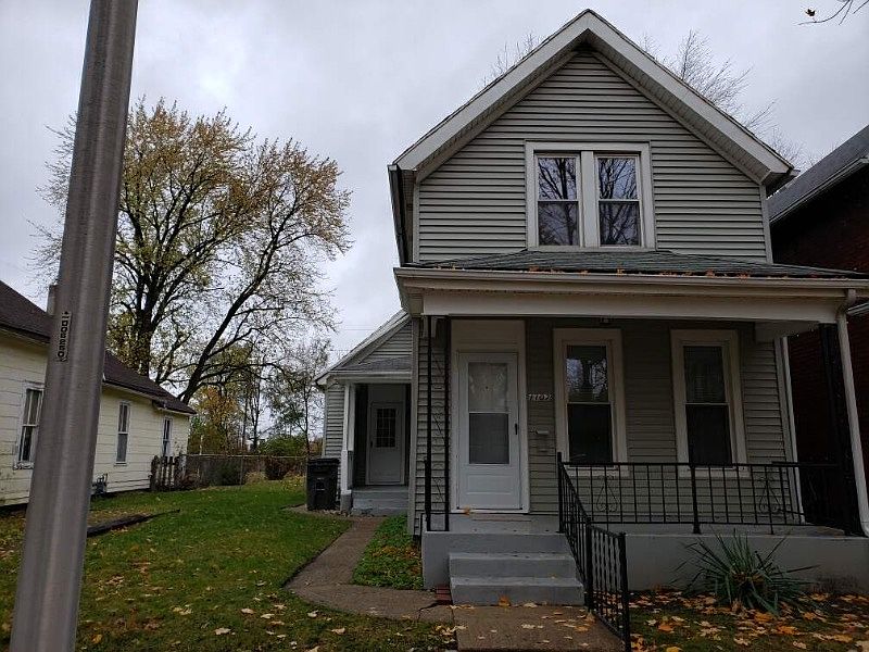 Front porch with off street parking on the left near side entrance