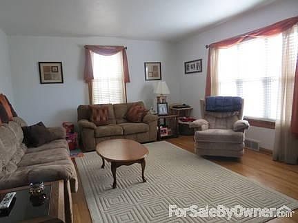 Custom window treatments included