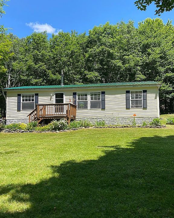 Front with new metal roof