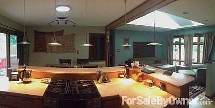 Modern Kitchen
						:
						An 'open' living re-design, with natural and halogen lighting.