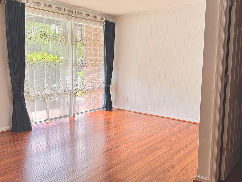 Living room with large windows for natural daylight!
