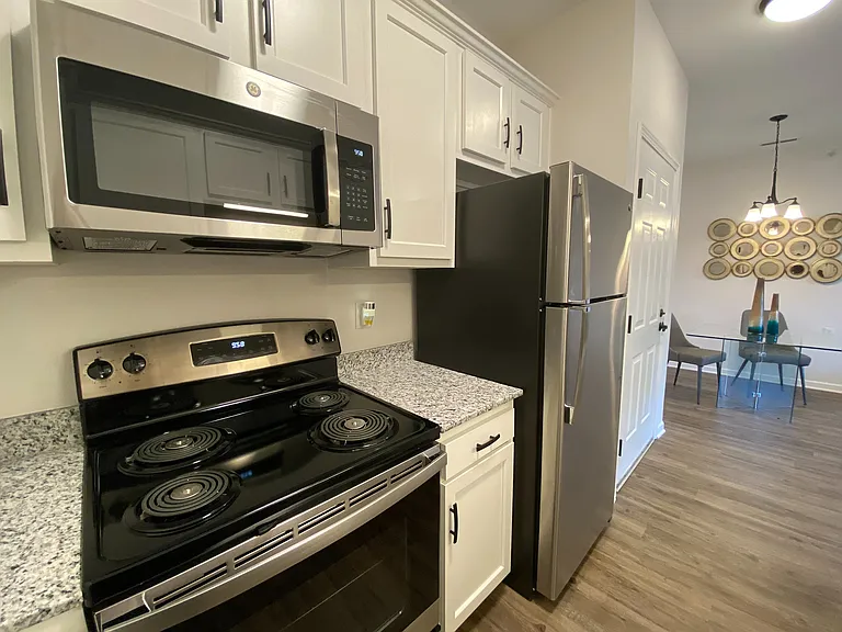 Stainless steel appliances and generous cabinet space bring style and utility to your daily routine.
