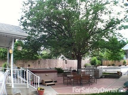 OASIS YOU MUST SEE THIS BACK YARD!
						:
						From Spas To Several Grilling Stations It's All Perfectly Landscaped!