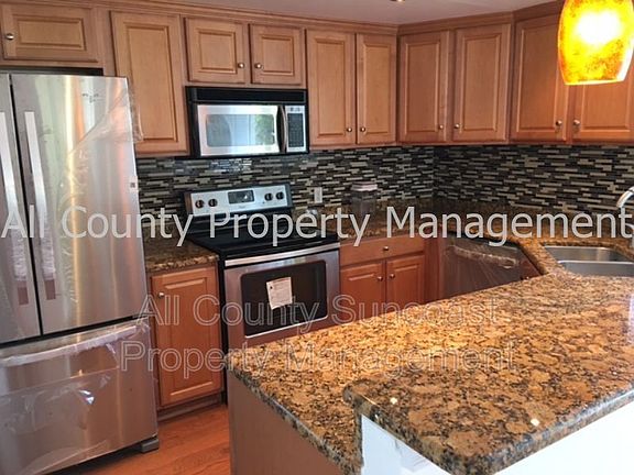 4th image of 4900 68th Ct N Unit 4900