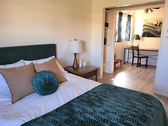 Master bedroom with extra space for office or dressing room. Private bathroom.