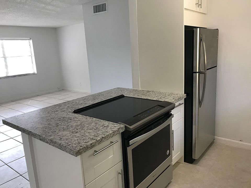 Kitchen out to living area.