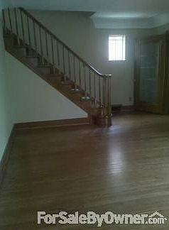 Living room
						:
						Living room with leaded glass door to foyer