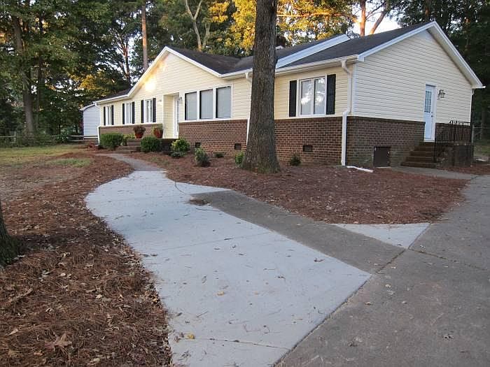 Newer side parking pad