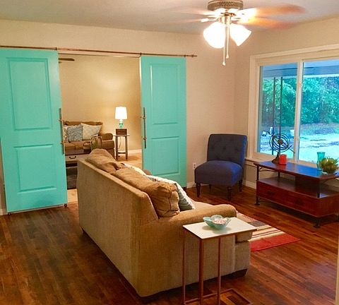 Living room looking into bed