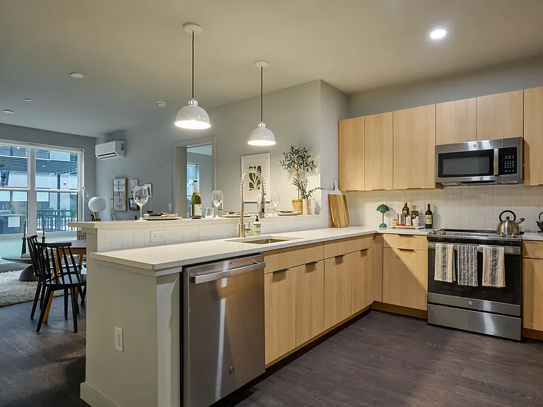 Large kitchen areas with stainless steel appliances