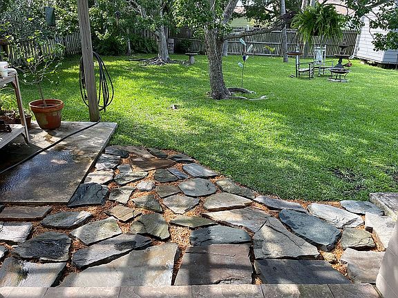 Approach to backyard. 