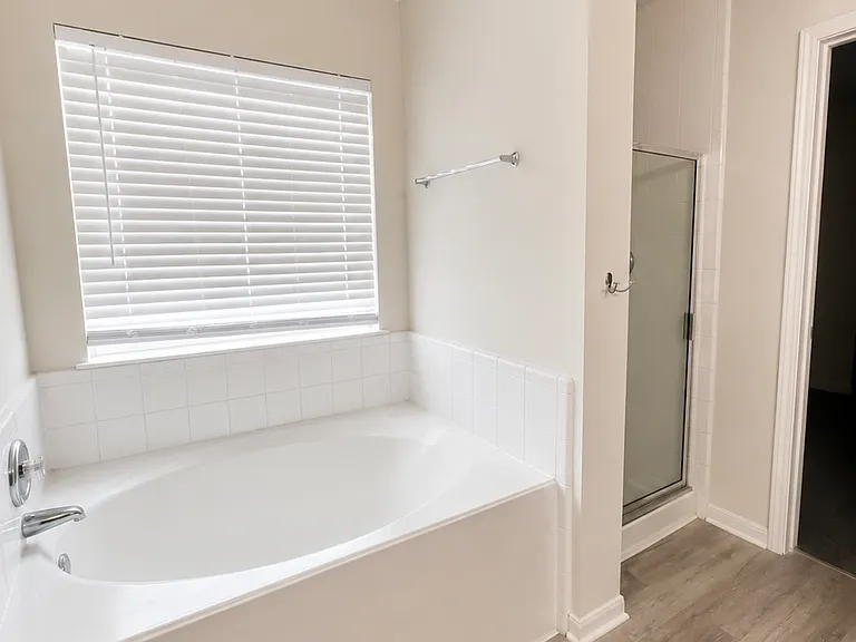 Detached garden tub from shower.