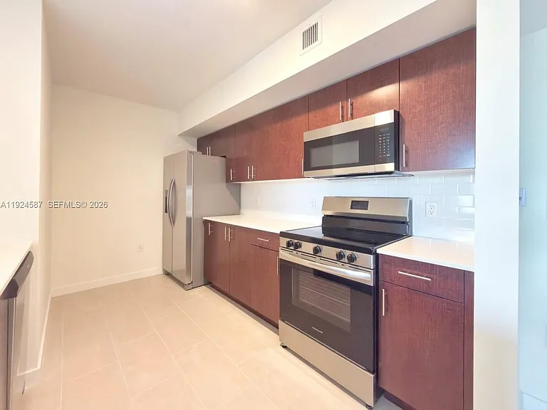 11239 NW 4th Ter #205 — Photo 1