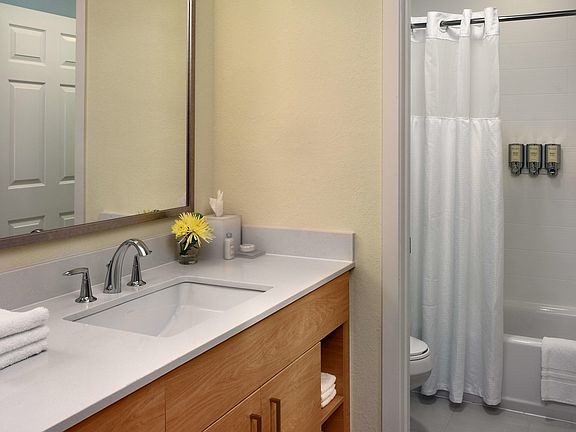 Bathroom includes hair dryer and Italian imported shampoo, c