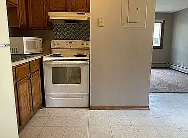 Elevate your culinary creativity in this stylish kitchen featuring modern appliances and ample storage space. The inviting layout seamlessly connects to the dining area, perfect for gatherings. See yourself living hereschedule a tour today!