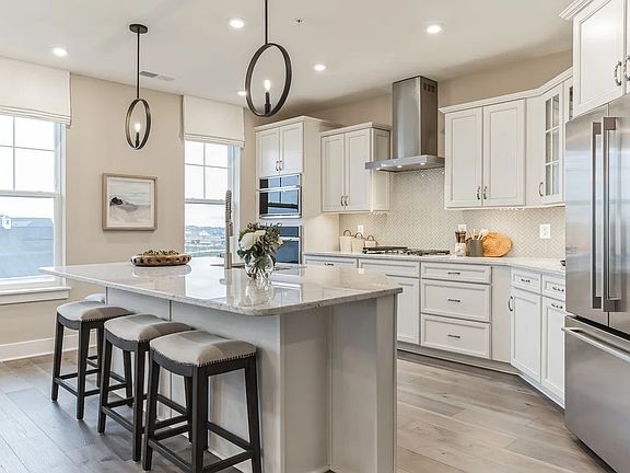 Kitchen with island and pendant lighting
