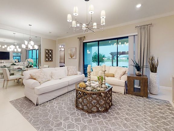 The Great Room is a natural entertainment space with easy access to the kitchen and covered terrace,