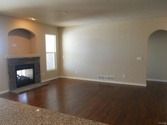 Great Room with See-Through Fire Place Shared with Deck Outside
