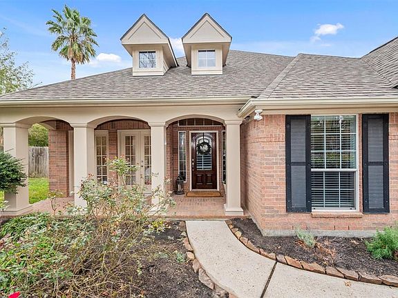 Well appointed front porch with beautiful architectural design!