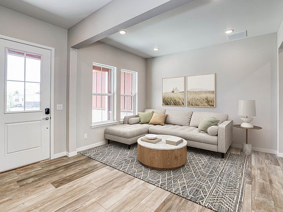 The stunning Salerno features an open flex space directly off the entrance.