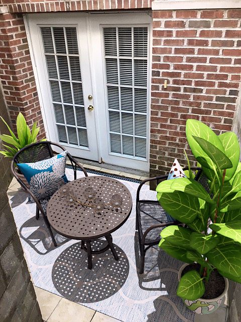 Private Rear Patio (Suite 401) 
French doors lead into living room of apartment. Peaceful & secluded outdoor space.