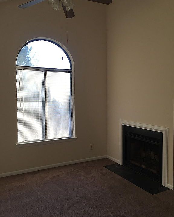 Living room and wood burning fireplace
