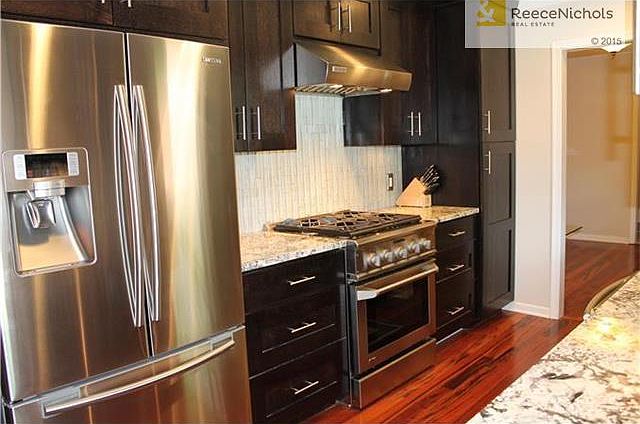 Custom Quarter sawn oak Kitchen cabinets w/ soft close drawers - Designer glass tile back splash - Canaan installed Granite countertops & Stainless steel Sink. - Delta touch2O faucet - GE Monogram duel fuel oven - Wolf Range hood - Miele dishwasher- Samsu