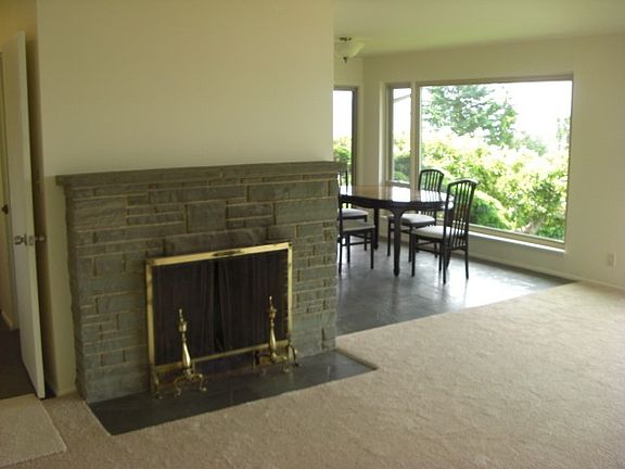 Large living room adjoins family room. Great view of the Puget Sound, Shipping Traffic and Moutains!