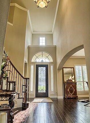 Tall ceilings, hand-scraped wood floors and designer features throughout!